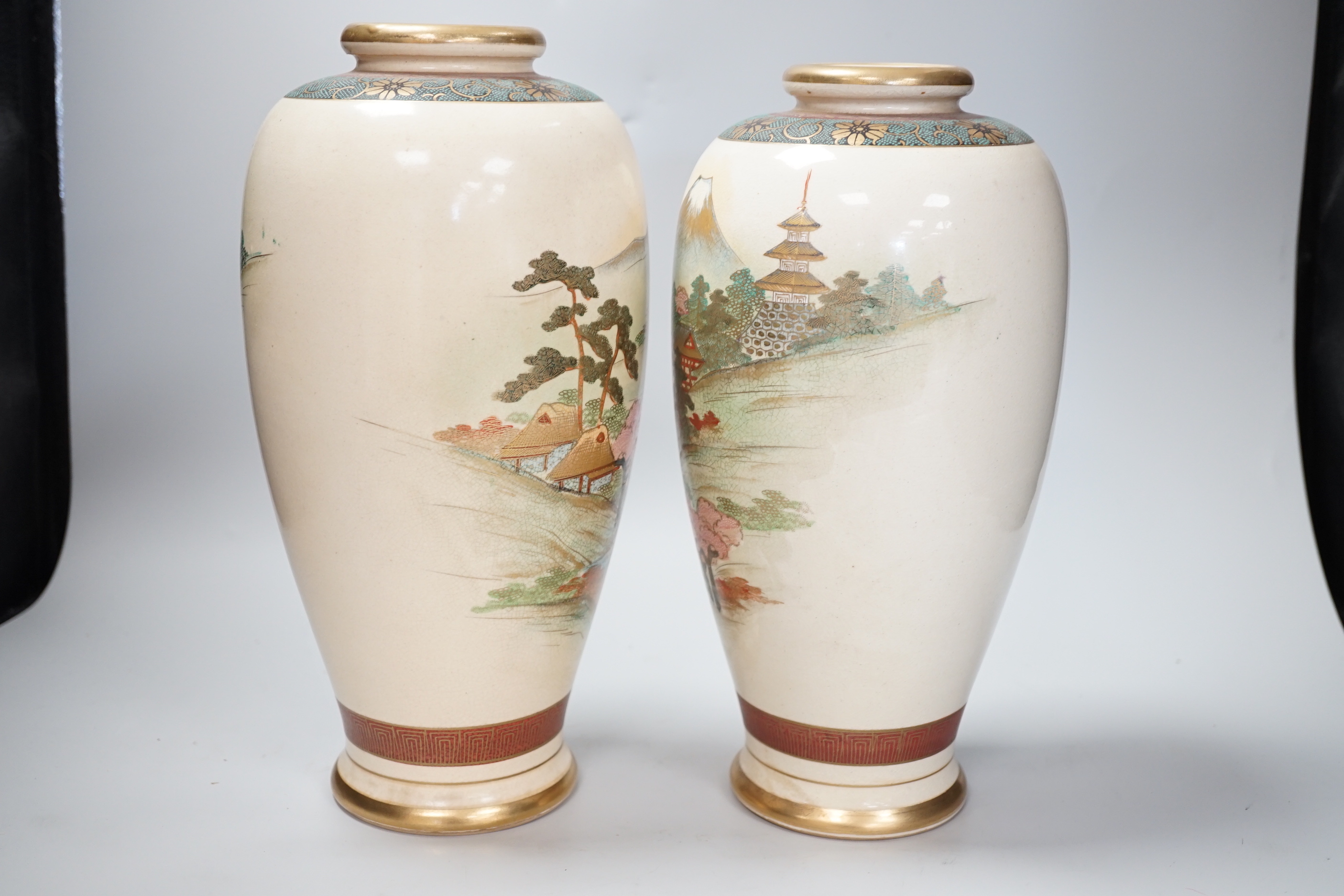 A near pair of Japanese Satsuma 'Mount Fiji' vases, 30cm